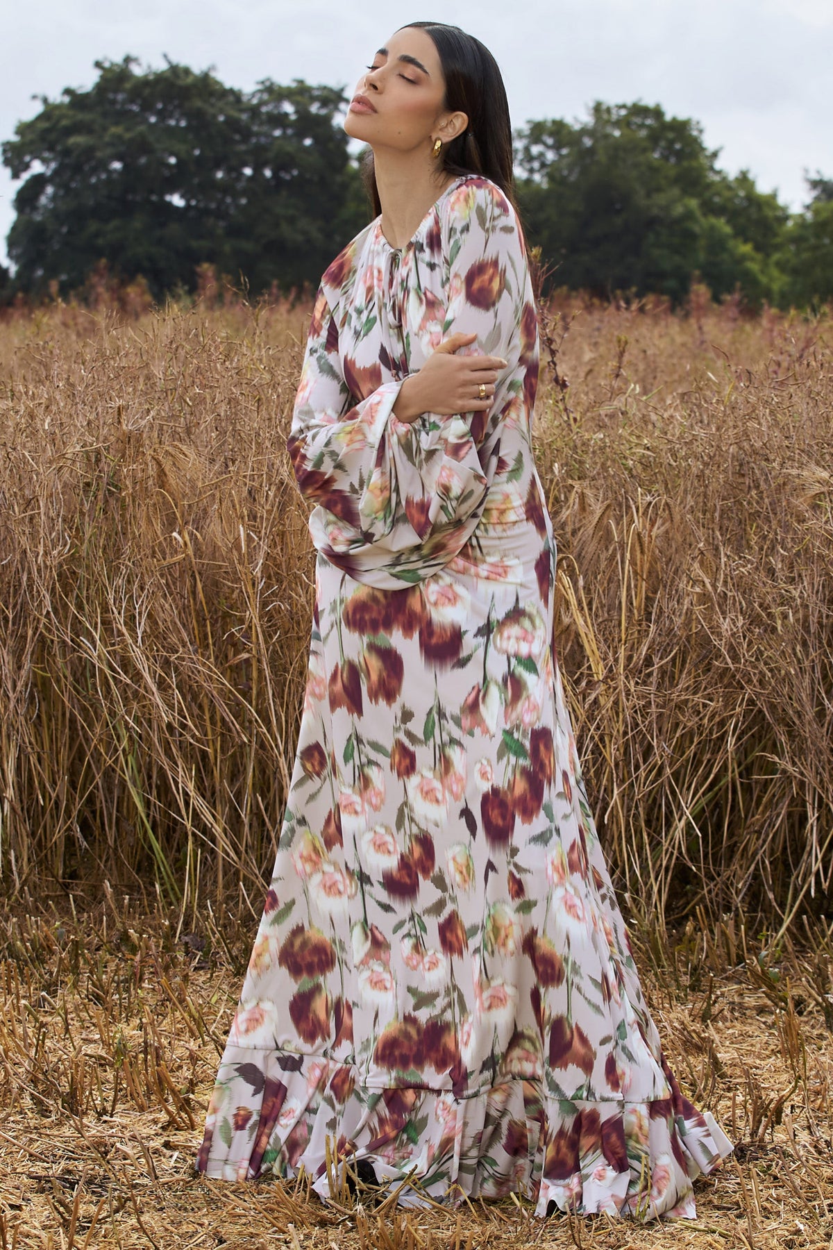 Althena | Cremefarbenes Maxikleid mit Blumenmuster und Ballonärmeln