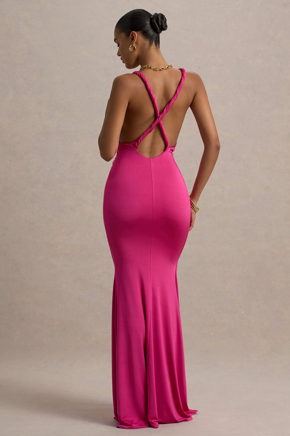 Santez | Heißes pinkfarbenes Maxikleid mit verdrehtem Plunge-Ausschnitt.